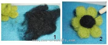 The center of the flower in black carded wool