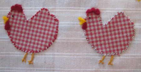 Fabric and embroidery chicken design on fabric background