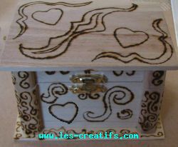 Pokerwork design on wooden jewelry box