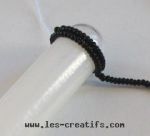 Wrap the thread of beads around the tube