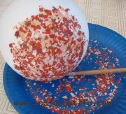 glueing flock paint flakes to a large ball