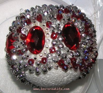 Ball with red cabochons