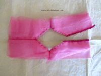 Sew the sleeves of the Barbie dress