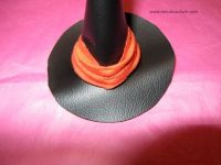 sewing ribbon on the hat