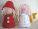 santa's little helper and christmas angel table decorations